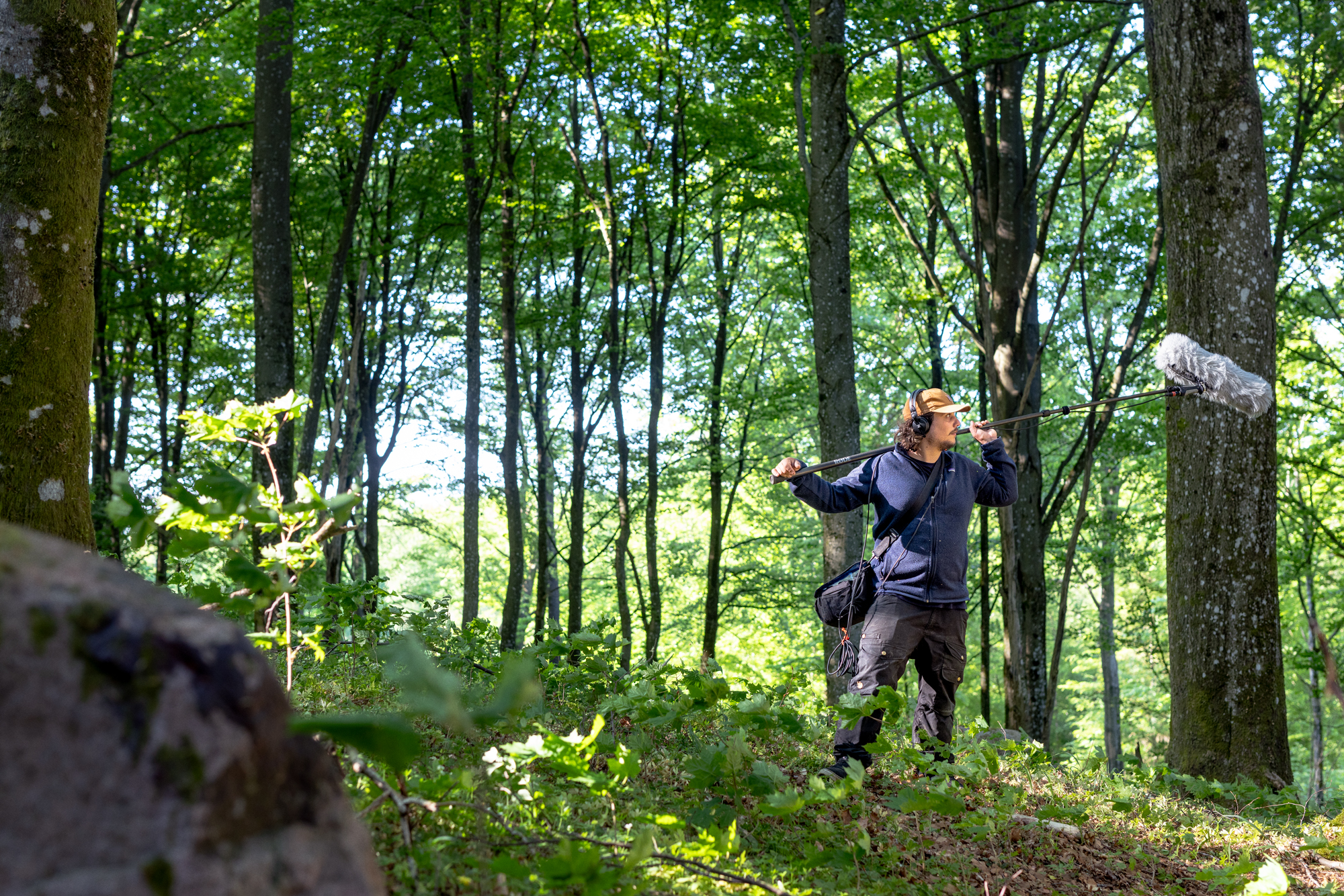 Sound technician in deep forest