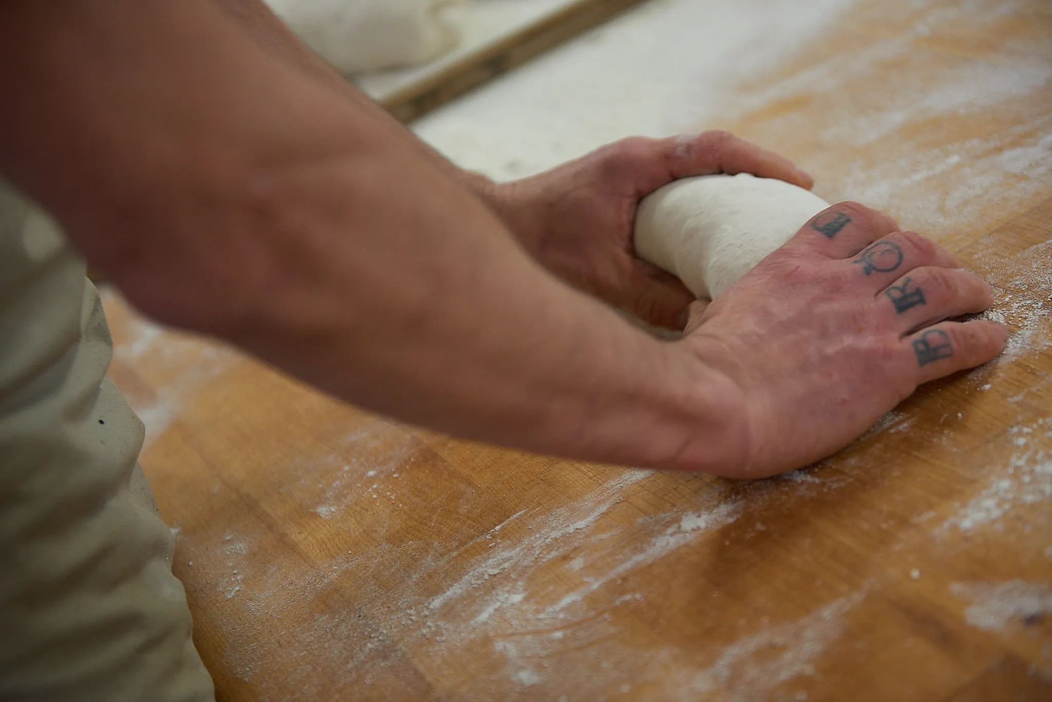 Hands kneading a dough