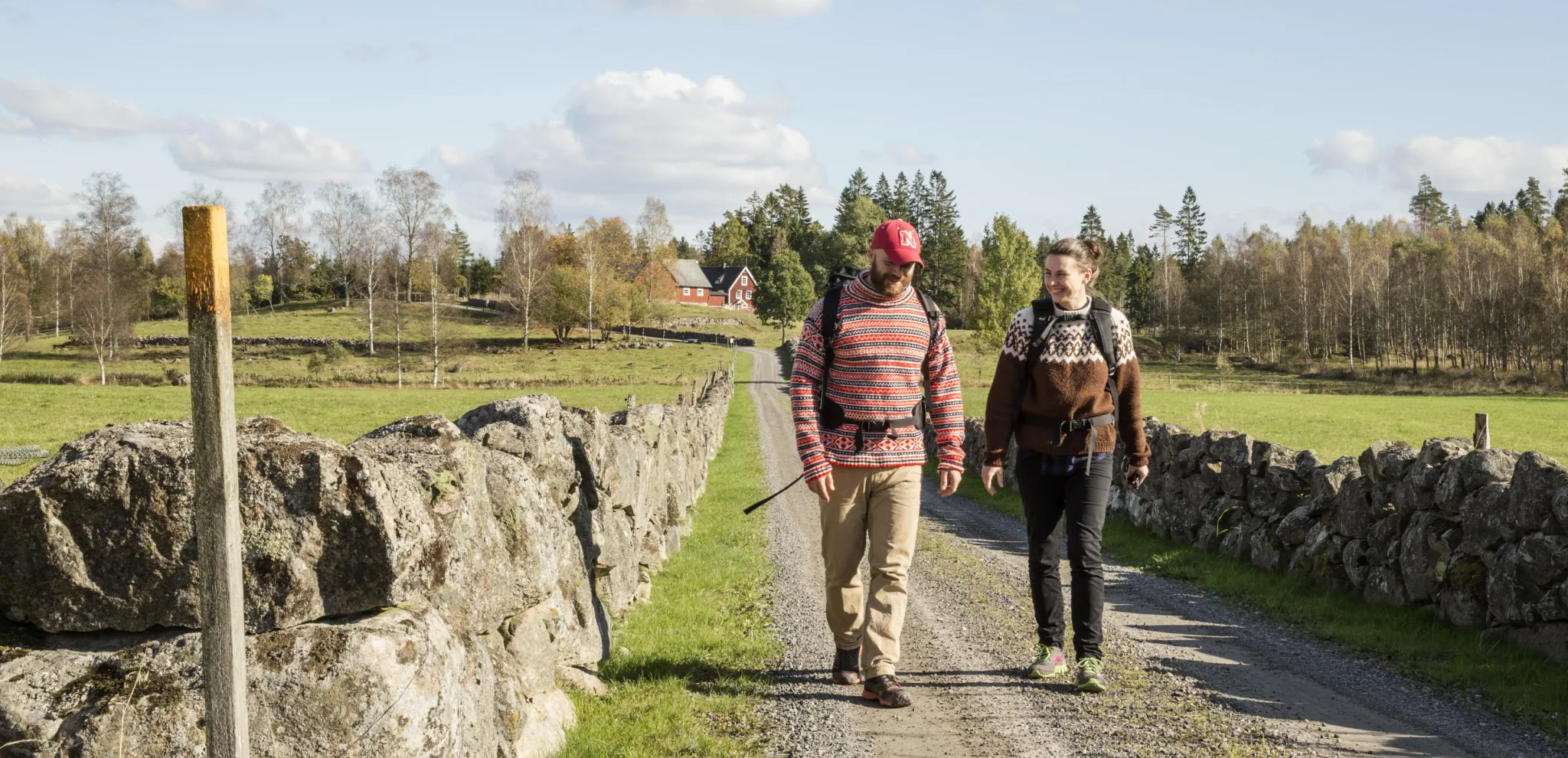 Couple walking on a nature road in the countryside