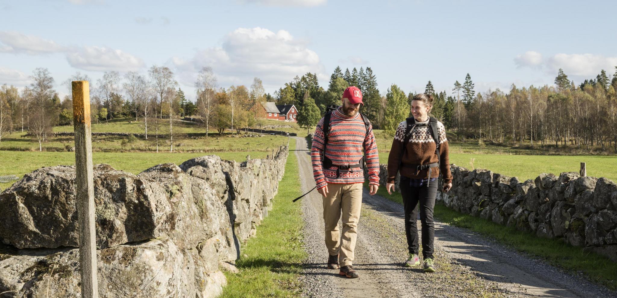 Couple walking on a nature road in the countryside