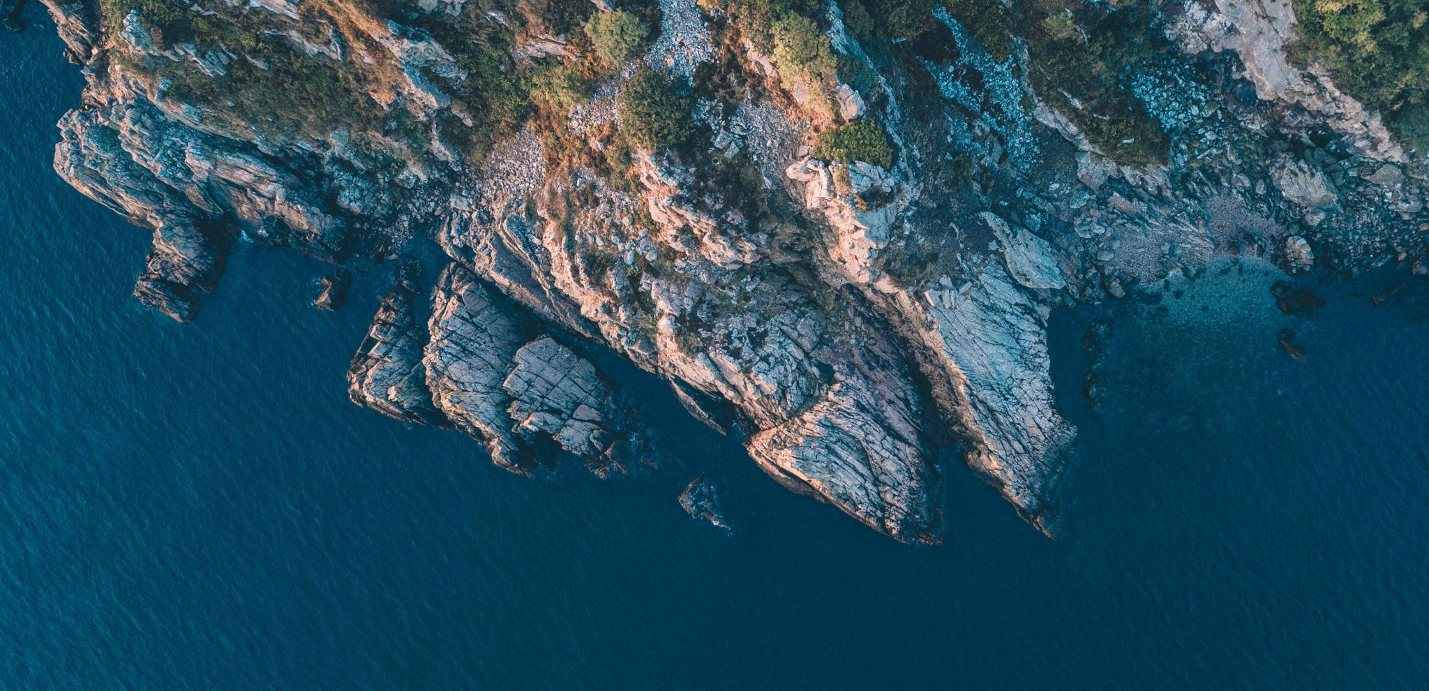 A view from above of the Kullaberg coastline with its cliffs and the sea