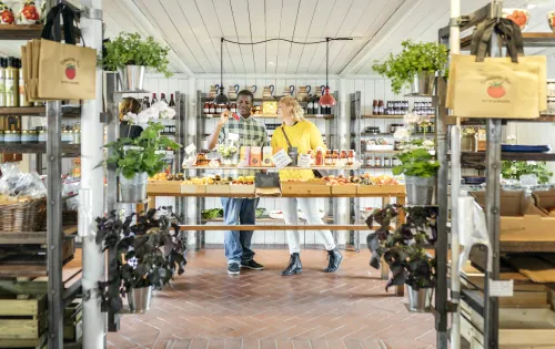 Vendors displaying goods in farm shop