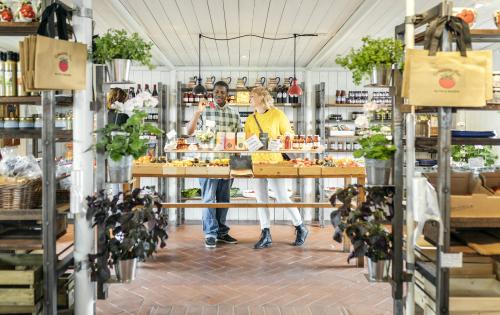 Vendors displaying goods in farm shop