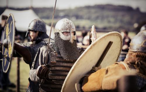 Vikings with sword and armour in a vikingvillage