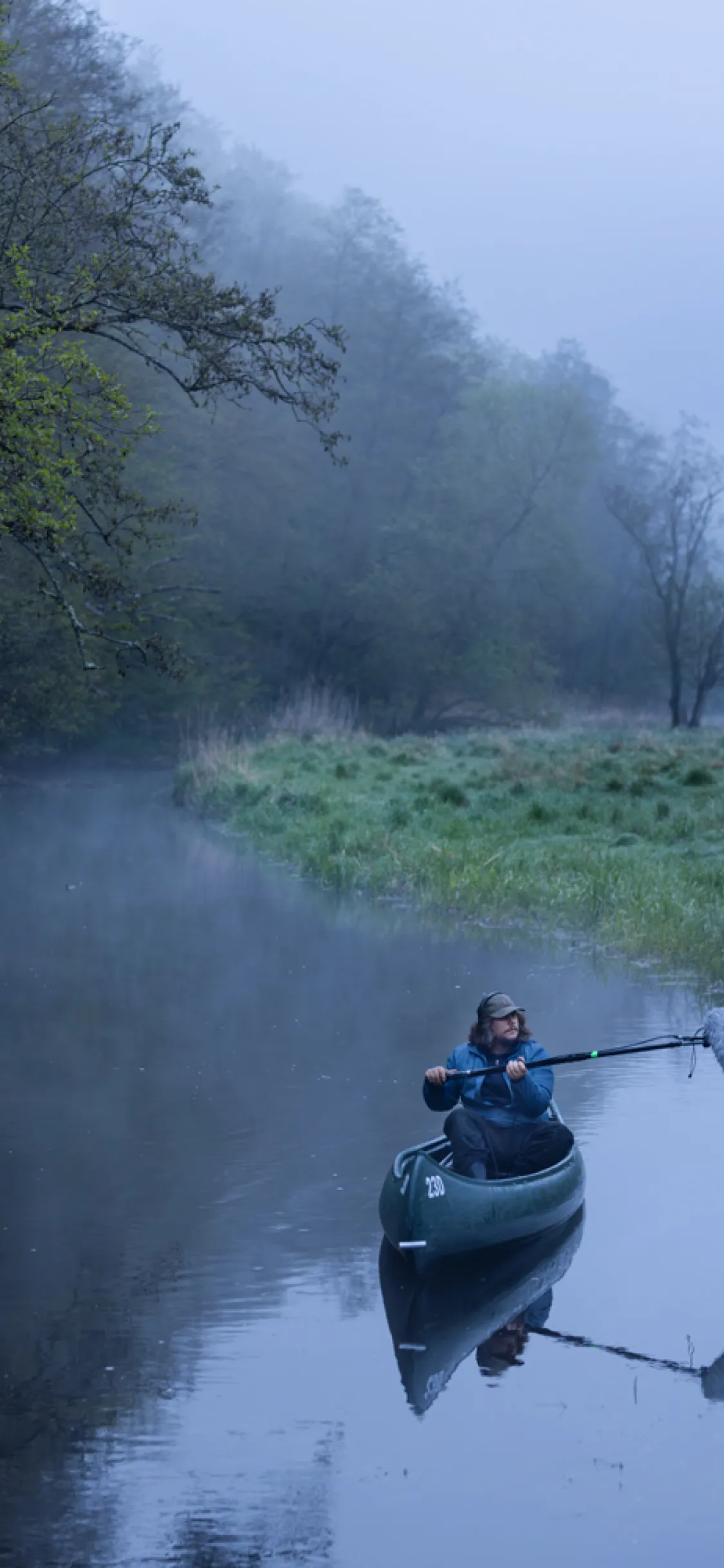 Sound guy in canoe in Rönne river