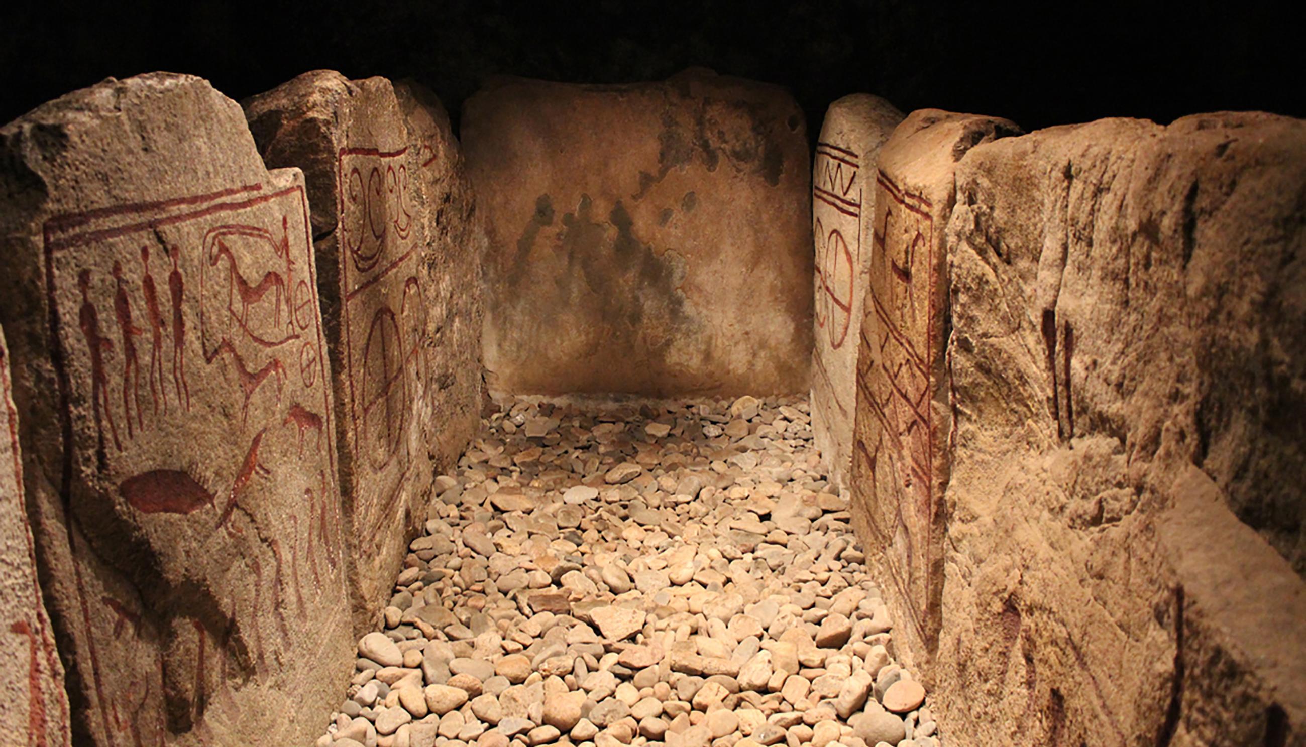 The Inside of a royal viking tomb in Kivik surrounded with rune stones