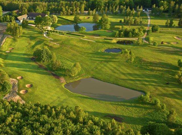 Golf plain with small pond